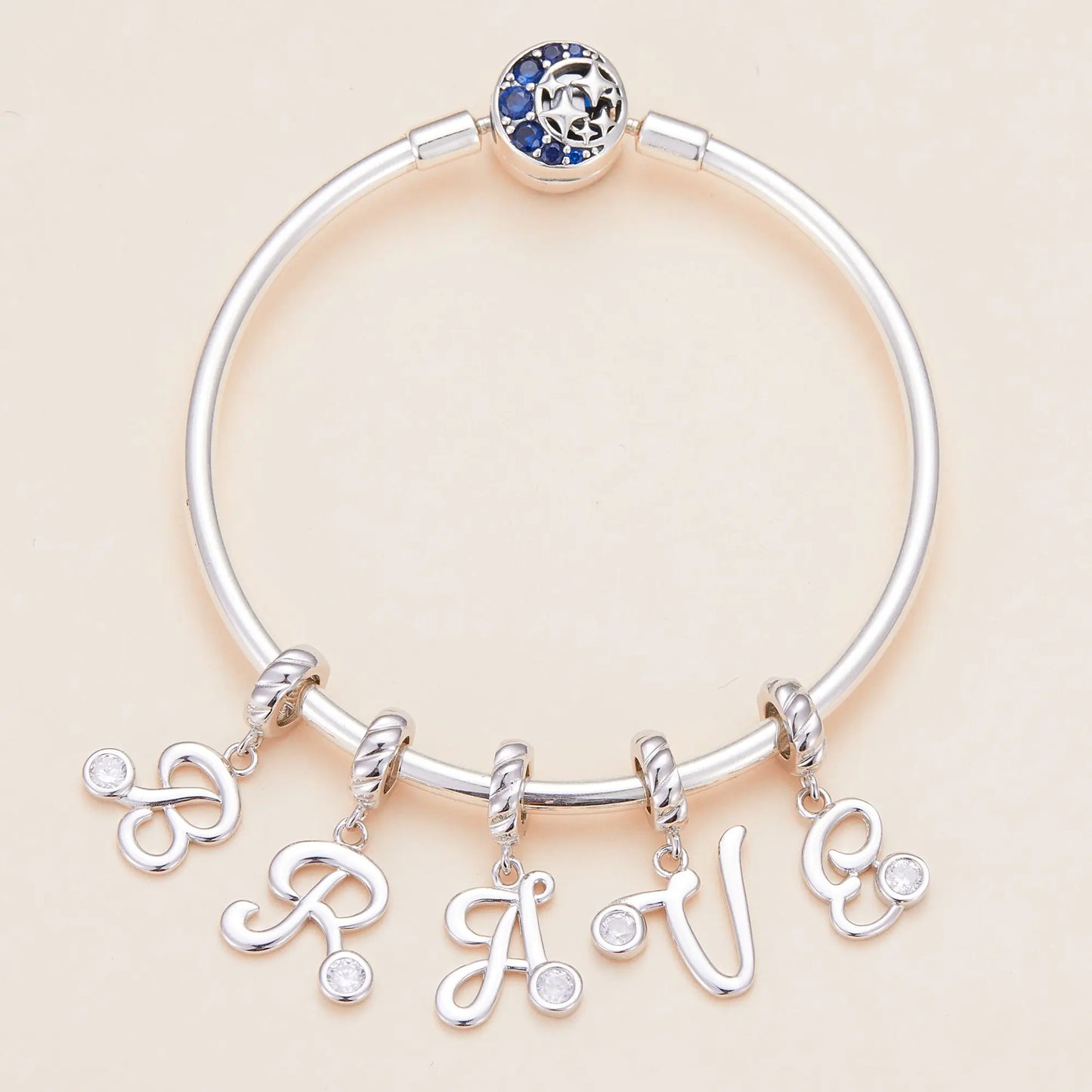 silver letter charm