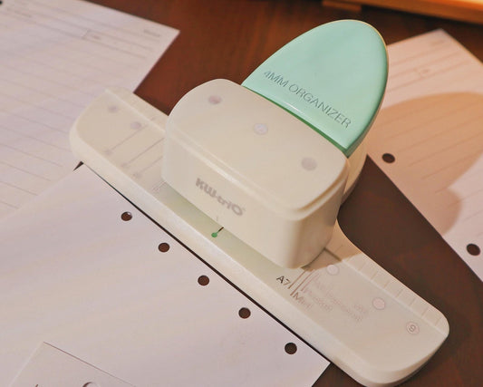 Precision hole punch for making planner and journal insert pages