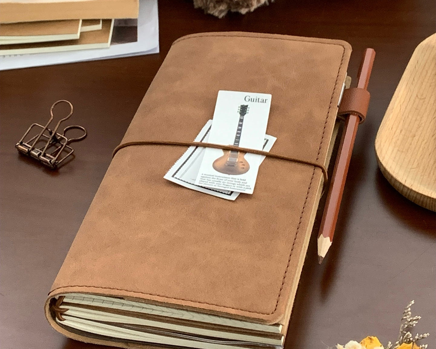 Standard size refillable faux leather notebook for travel journaling and planning