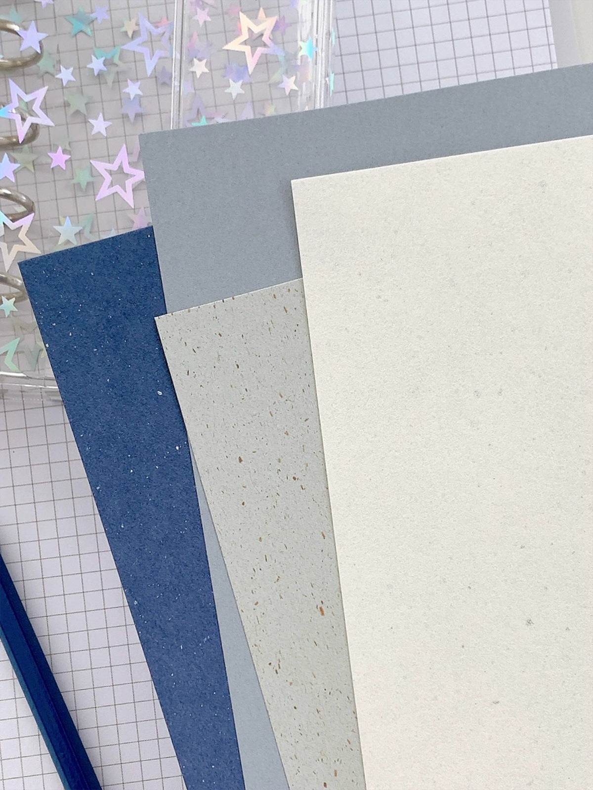 Specialty paper binder insert detail in sea blue colors for planner layouts
